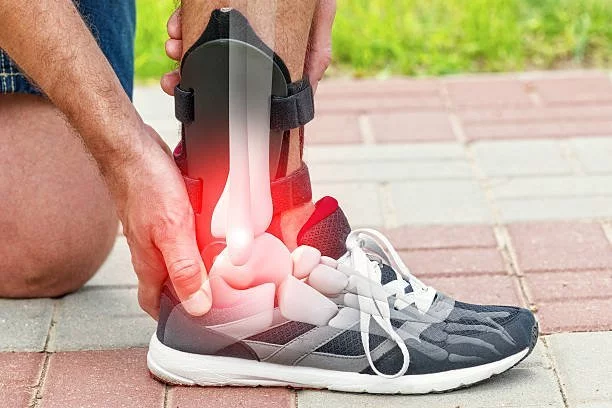Man in athletic sneakers checking his ankle orthosis or brace on the street