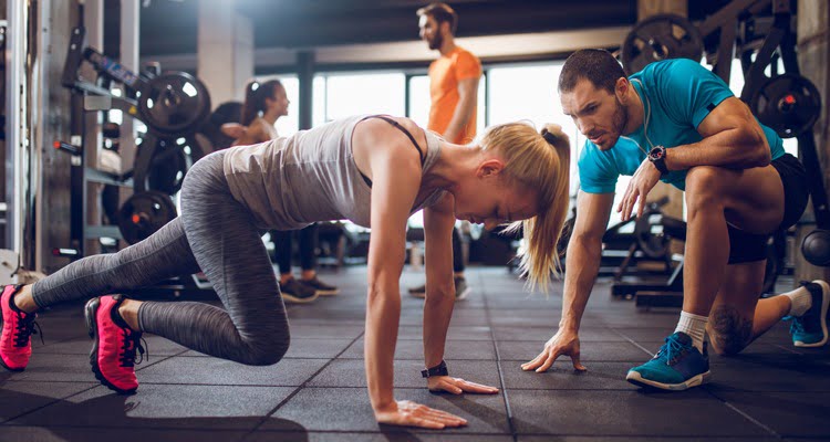 Female Exercising and Personal Training with Male Kinesiologist